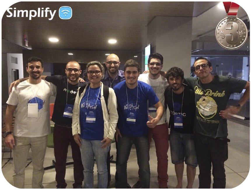 The eight-person Simplify team at the Startup Weekend, with the Simplify logo and a third-place medal